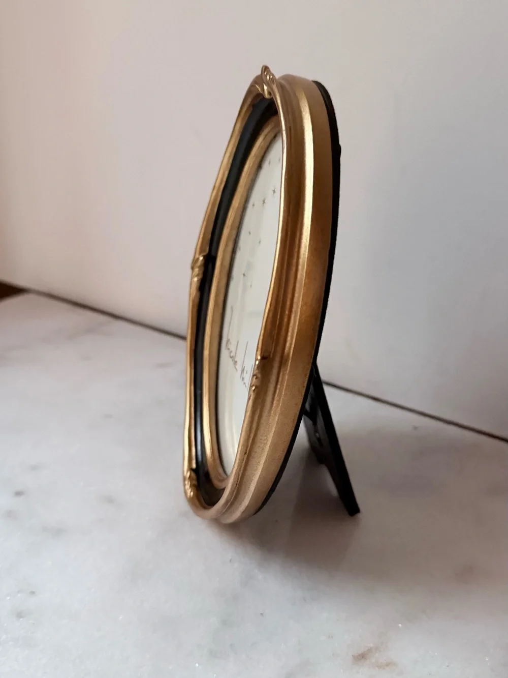 Nicole Miller stylish oval